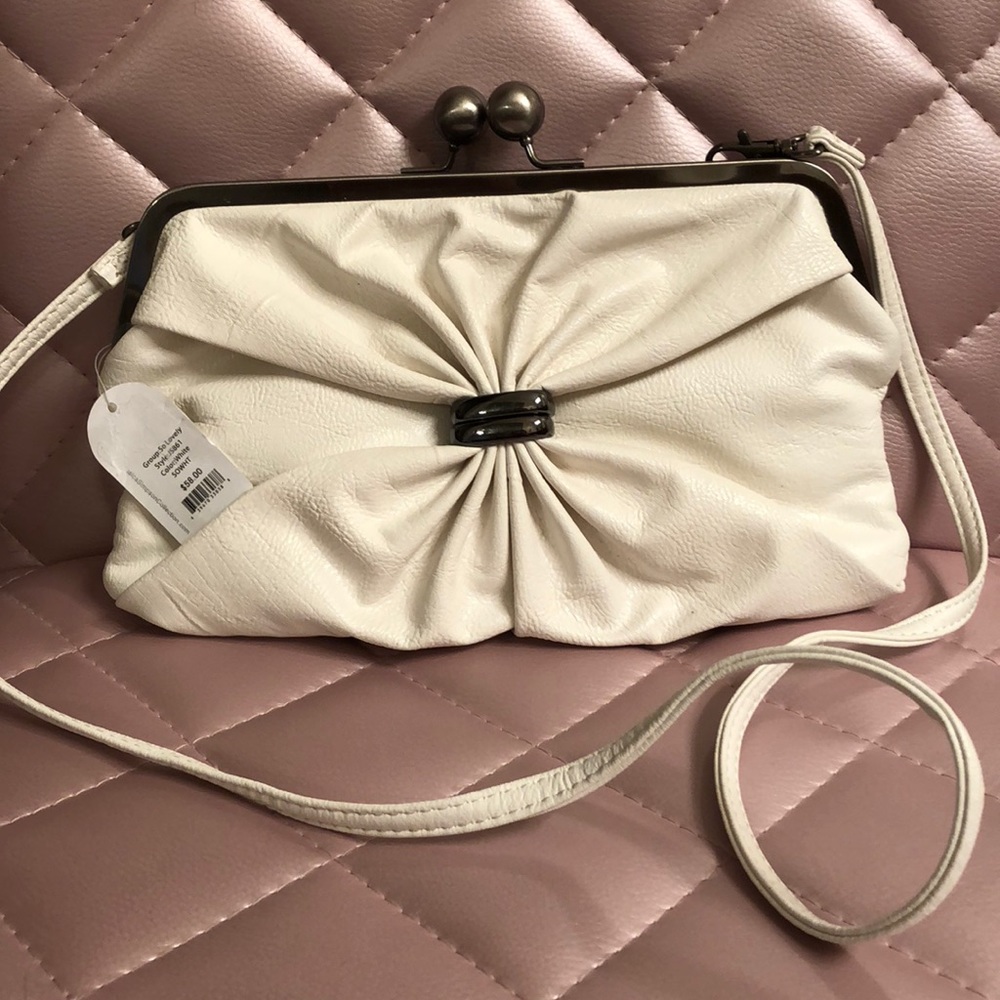 Jessica Simpson white clutch with removable strap